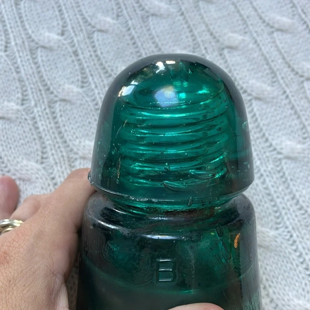 Antique glass insulator. Aqua teal glass. Threads inside stamped B on outside